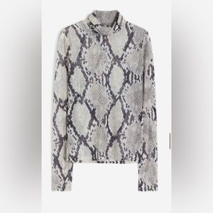 Brand new gorgeous sheer snake skin turtleneck